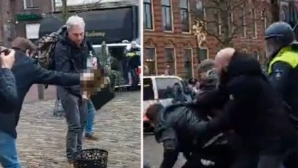 Hollanda'da Kur'an-ı Kerim'in yakılmasına engel olmak isteyen protestoculara polisten sert müdahale 